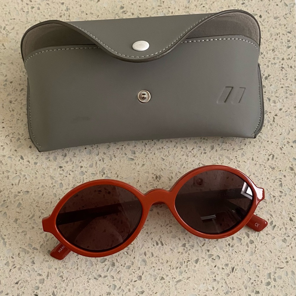 Le Specs Red Oval Sunglasses with Gray Case